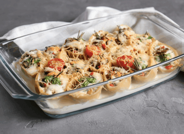 Pastaschelpen gevuld met champignons